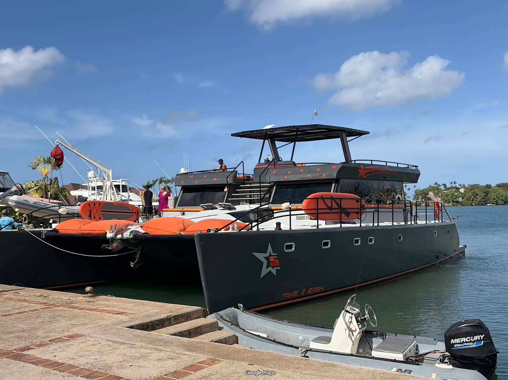 Private power catamaran docked at the marina
