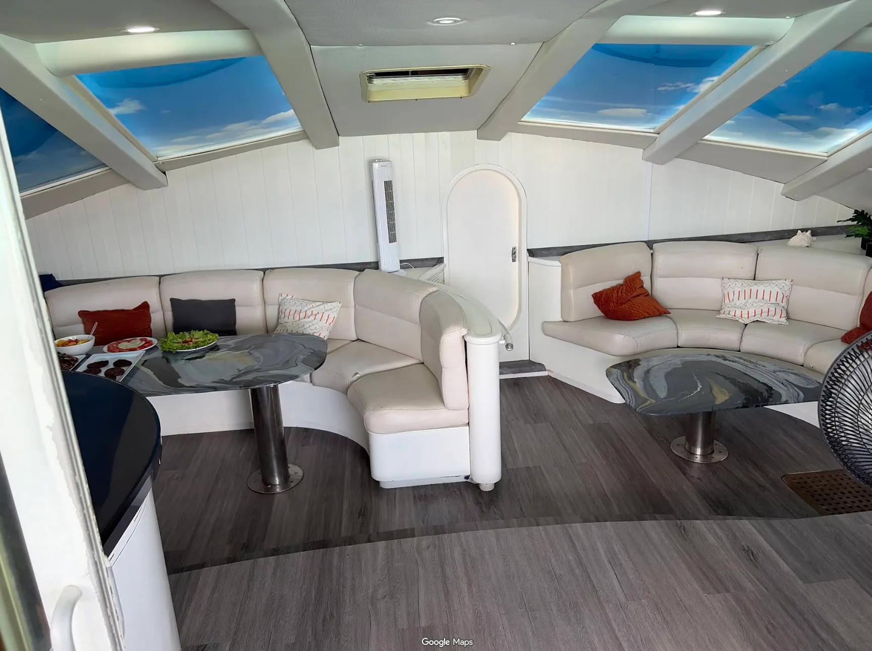 Bright indoor seating area on board